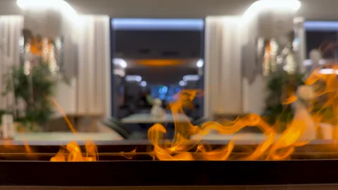 Close-up on bio fireplace burning inside restoran. Detail in interior Stock Footage 287457137