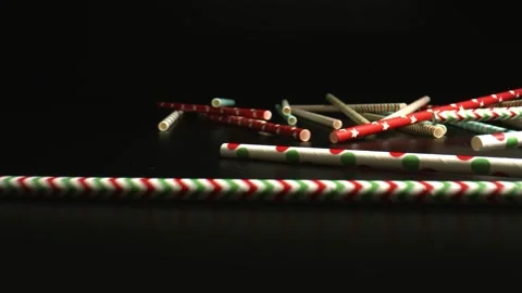 Close up biodegradable colored drinking straws. Bulk Paper Straws for Juices Stock Footage 144342595