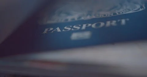 Close up of biometric British passport at border control in Airport Vidéo 136967210