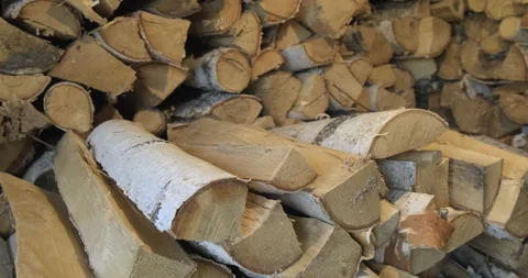 Close-up of Birch Firewood. Stacked in Rows in Village Shed. Stocks for Winter. Stock Footage 132470800