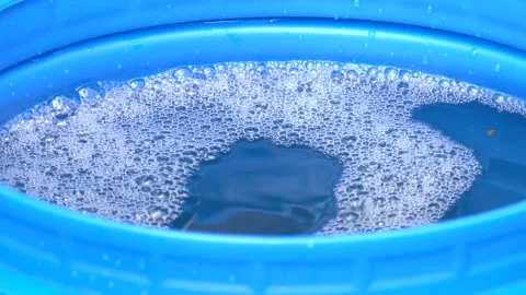 Close up of birch sap dripping into a bucket Video stock 274901802
