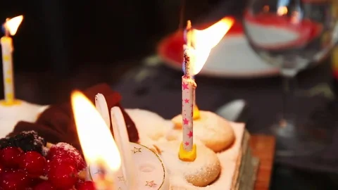 Close up of birthday candles burning. Stock Footage 79313068