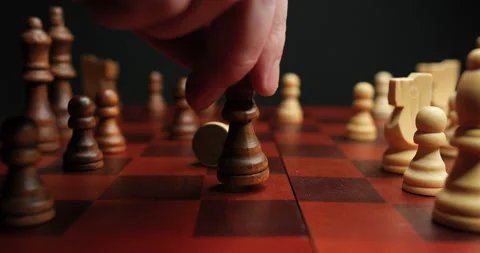 Close Up of Bishop Taking Bishop in a Chess Game Stock Footage 236942697