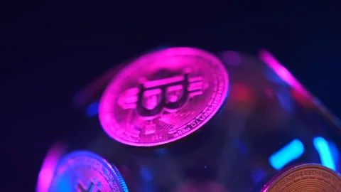 Close up Bitcoin BTC Bit-coin symbol on golden coins spinning on dark Stock Footage 269455769