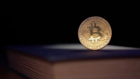 Close up bitcoin coin with dark textured background.Digital Currency. Stock Footage 322085866
