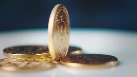 Close-up of Bitcoin coins on a surface Video stock 328169966