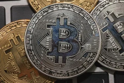 Close up of bitcoin on the keyboard Stock Photos