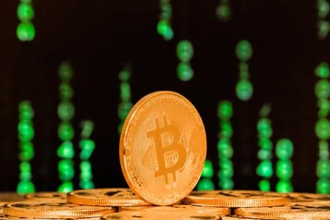 Close up of bitcoin with numbers in backgrounds Foto stock