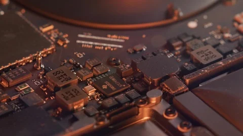 Close up of Bitcoin on top of a motherboard computer chip. Cryptocurrency. Stock Footage 122663630