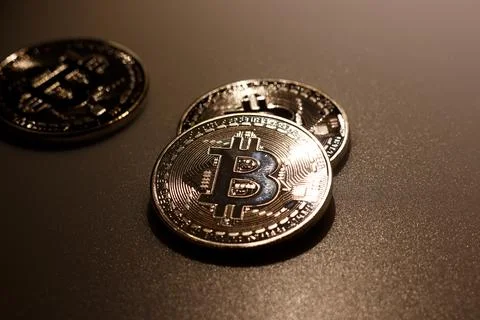 Close up bitcoins on table and reflection of light Stock Photos
