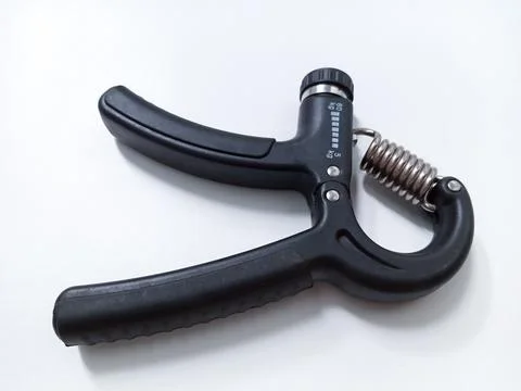 Close up Black Adjustable Hand Grip Strengthener Isolated On White Backgrou.. Stock Photos