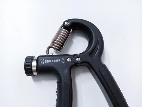 Close up Black Adjustable Hand Grip Strengthener Isolated On White Backgrou.. Foto stock