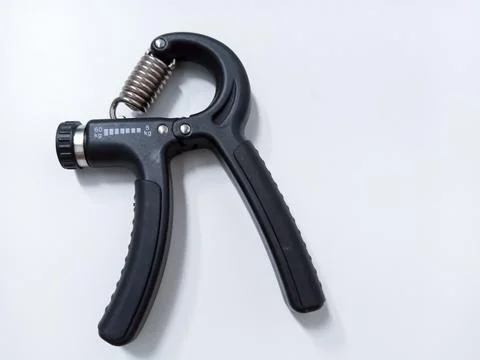 Close up Black Adjustable Hand Grip Strengthener Isolated On White Backgrou.. Stock Photos