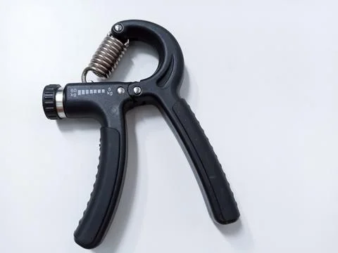 Close up Black Adjustable Hand Grip Strengthener Isolated On White Backgrou.. Stock Photos