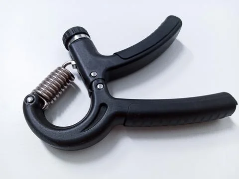 Close up Black Adjustable Hand Grip Strengthener Isolated On White Backgrou.. Stock Photos