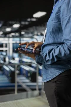 Close up of black admin using tablet to do infrastructure AI machine learning 스톡 사진