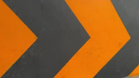 Close-up of a black and orange diagonal wall Stock Footage 312095611