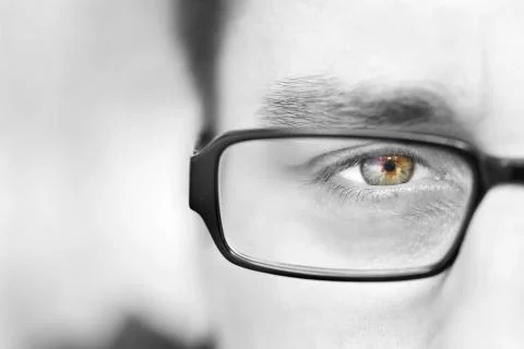 Close-up black and white half portrait of man green eye Stock Photos