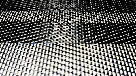 Close-up of black and white houndstooth fabric texture. Classic woven pattern Stock Photos