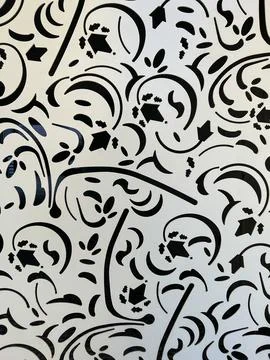 A close up of a black and white pattern on a wall Stockfoto's