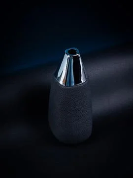 Close-up of a black automatic transmission knob made of leather on a black ba Stock Photos