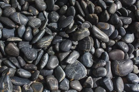 Close up of black basalt pebbles Stock Photos