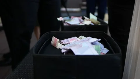 Close-up of a black box in which people put money. Stock Footage 148420696