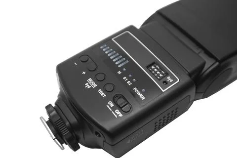 Close-up of a black camera flash speedlight back control panel with buttons.. Stock Photos