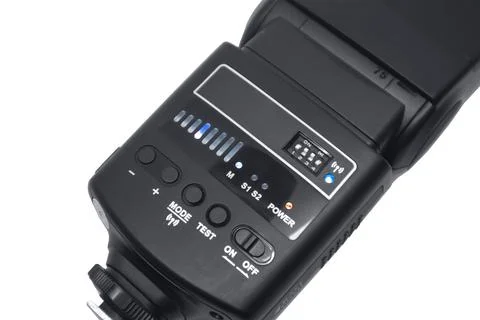 Close-up of a black camera flash speedlight back control panel with buttons.. Fotos Stock