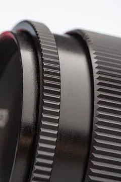 Close-up of black camera lens with textured rings 库存照片