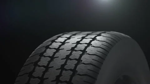 Close up on a black car tire in motion. 4K Animation Render Stock Footage 139860249