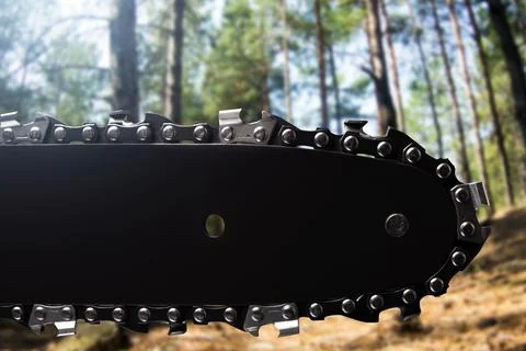 Close-up black chainsaw blade. Stock Photos