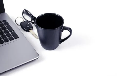Close up of Black coffee cups with labtop computer car key and eyeglasses o.. Stock Photos