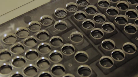 Close-Up of Black Computer Keyboard With Plastic Keyguard for Visually Impaired  Stock-Footage 312274508