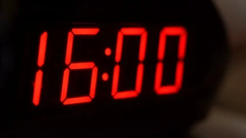 Close-up of black digital clock screen showing 16.00. Modern timer system Stock Footage 121256770