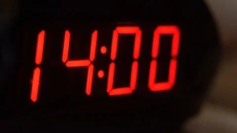 Close-up of black digital clock screen showing 14.00. Modern timer system 스톡 동영상 121257099