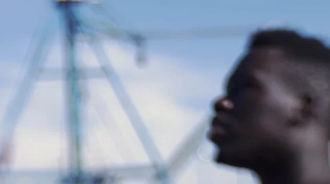 Close-up black guy looking around the harbor 02 Video stock 67527385