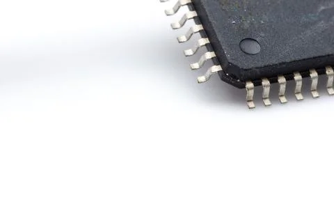 Close-up of black integrated circuit with silver pins Stock Photos