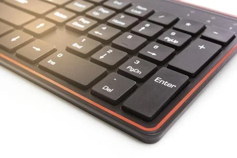 Close up of black keyboard on white background,light effect Stock Photos