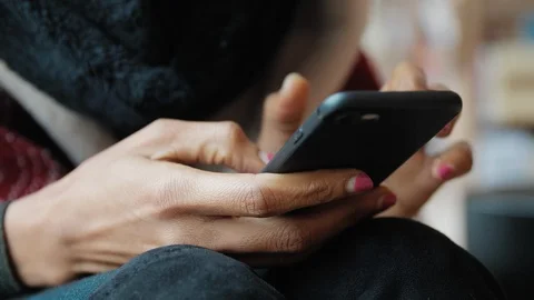 Close up of black lady hand using mobile phone Stock Footage 122708935