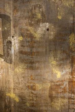 Close-up of a black leaf shadow from the sun light on a brown plywood surface Stock Photos