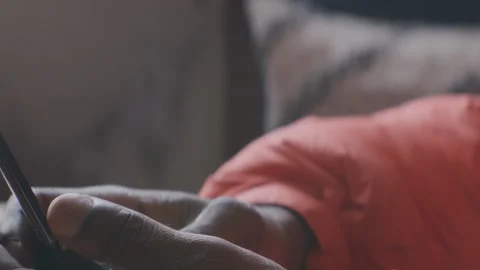 Close Up of Black Man Dialing Number and Talking on Flip Phone Видео 329578970