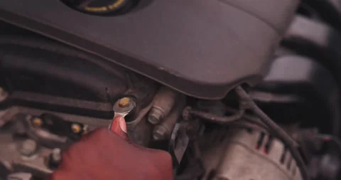 Close-Up of Black Man fixing car 库存影片 347876752