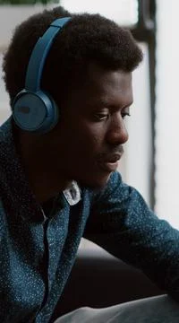 Close up black man hands browsing using laptop computer, searching social media 写真素材
