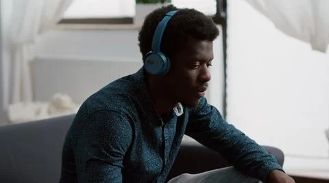Close up black man hands browsing using laptop computer, searching social media 写真素材
