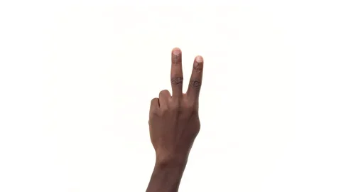 Close up of a black man's hand counting to five with his fingers. Isolated on a Stock Footage 161900394