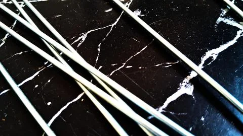 Close-up of black marble surface with white veins. Elegant natural stone texture Stock Photos