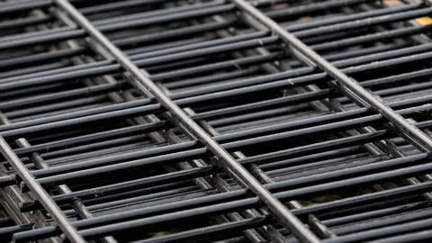 Close-up of Black Metal Grating with Parallel Lines Stock-Fotos