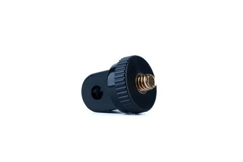Close-up of a black metal threaded adapter component on white background. Foto stock