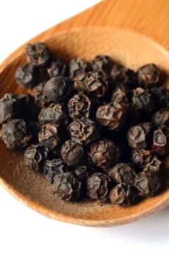 Close-up of black peppercorns Stock Photos